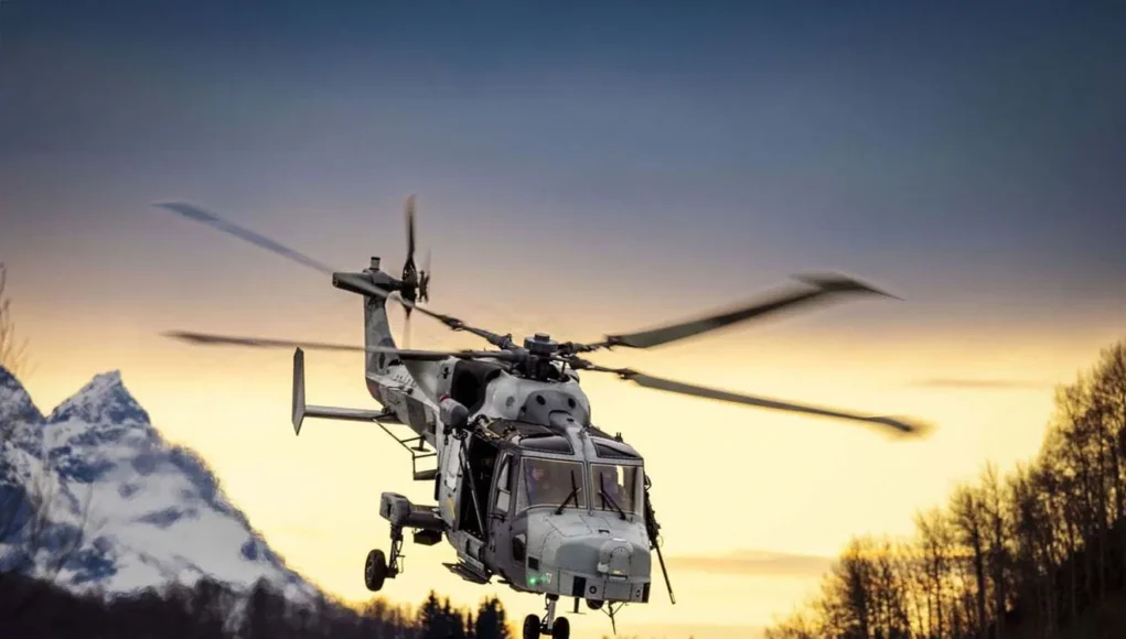 A Wildcat returns to base at Elvenes as the sun goes down