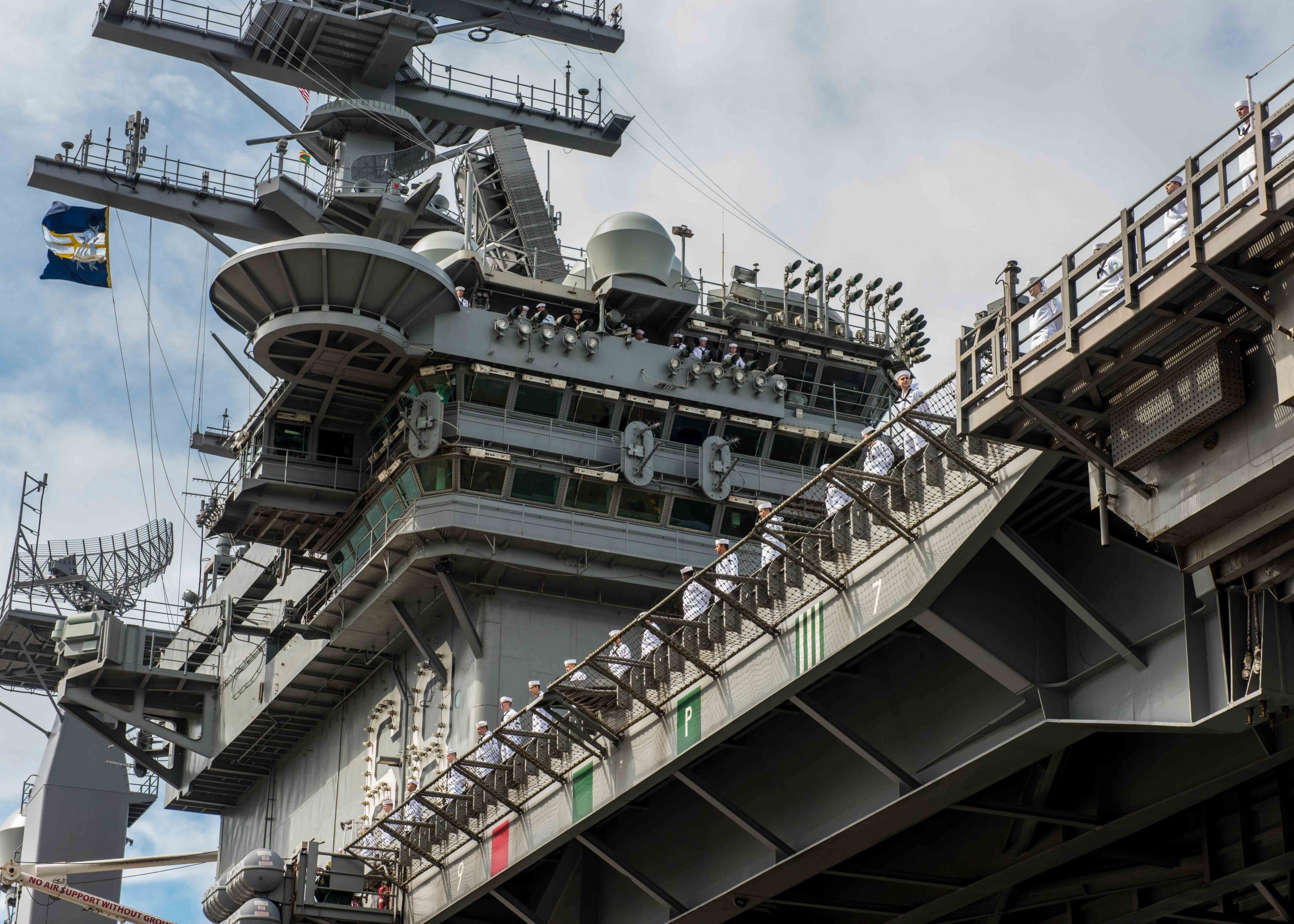 Supercarrier USS Nimitz and escort vessels deploy
