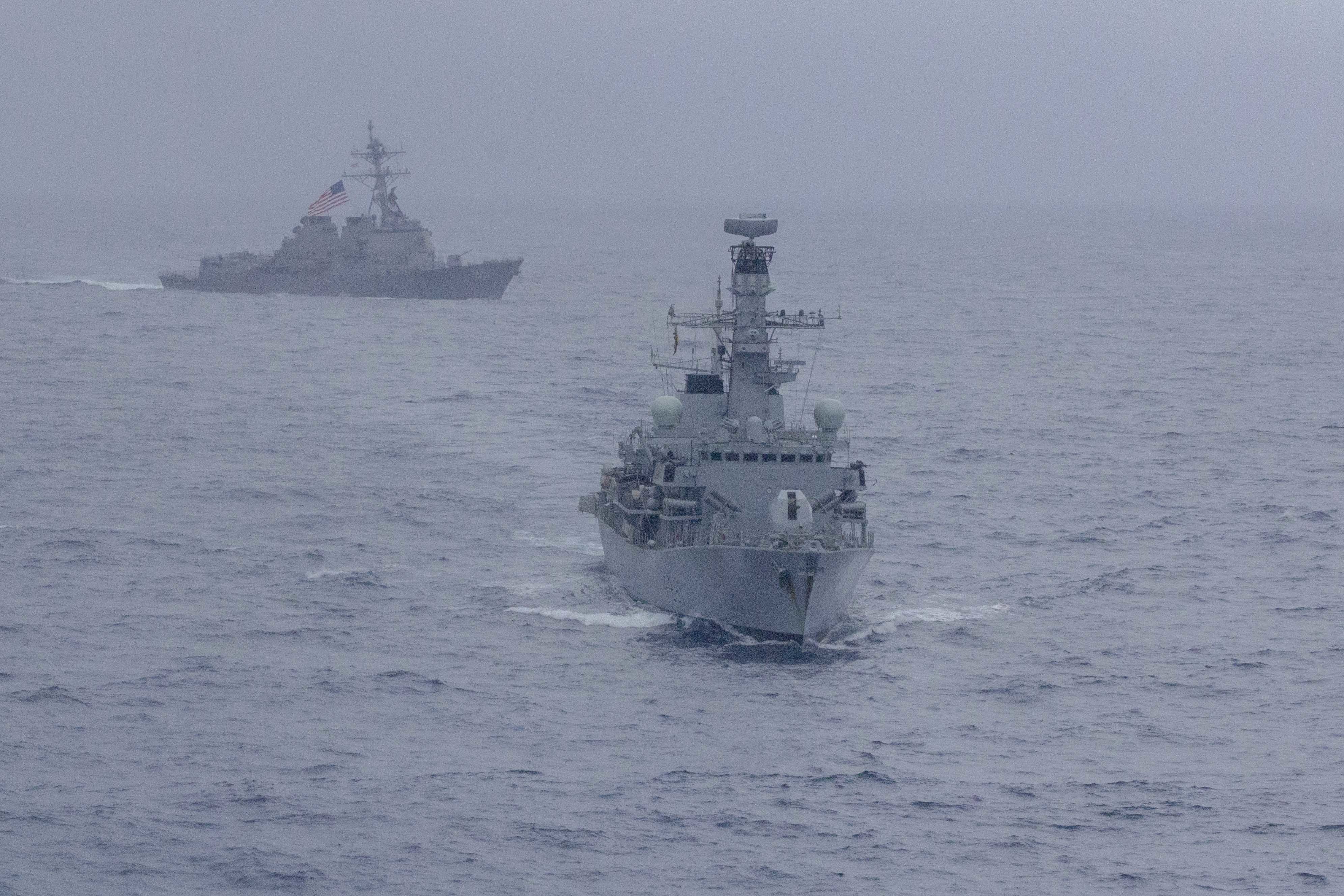 British and American warships exercise in disputed South China Sea